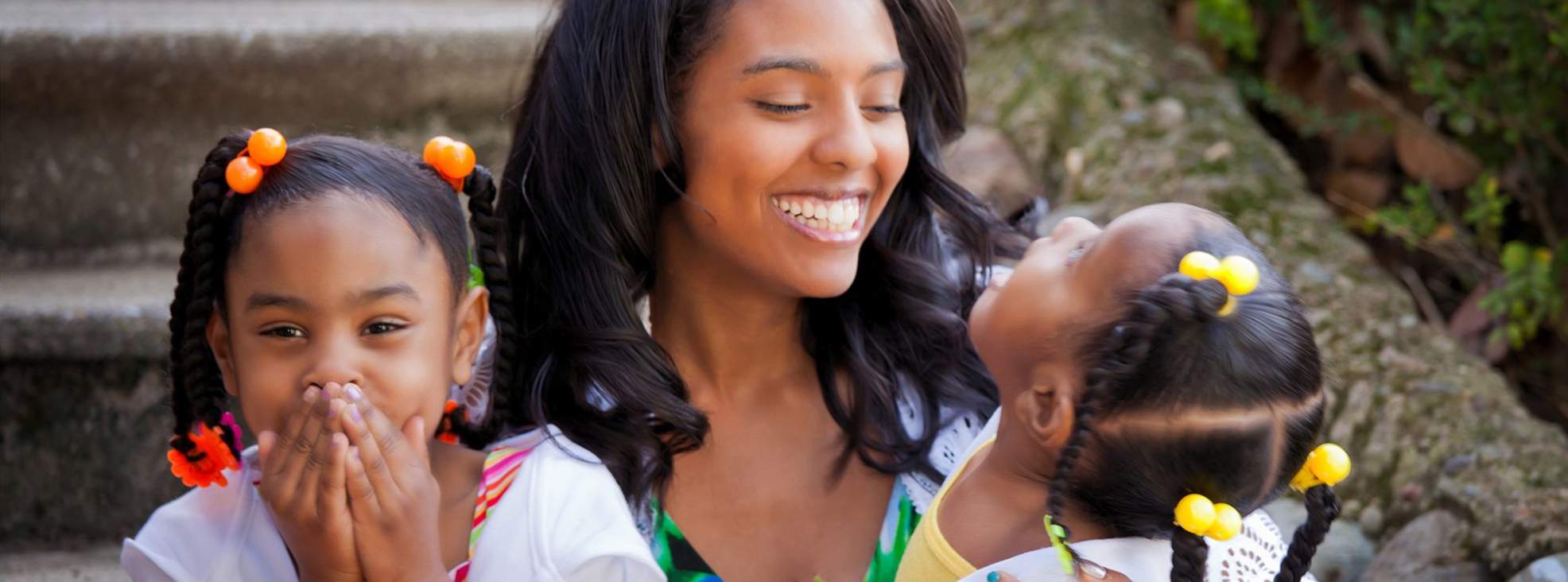 Photo of a happy family assisted by Women's Empowerment